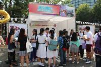 Secondary school students visiting the College booth